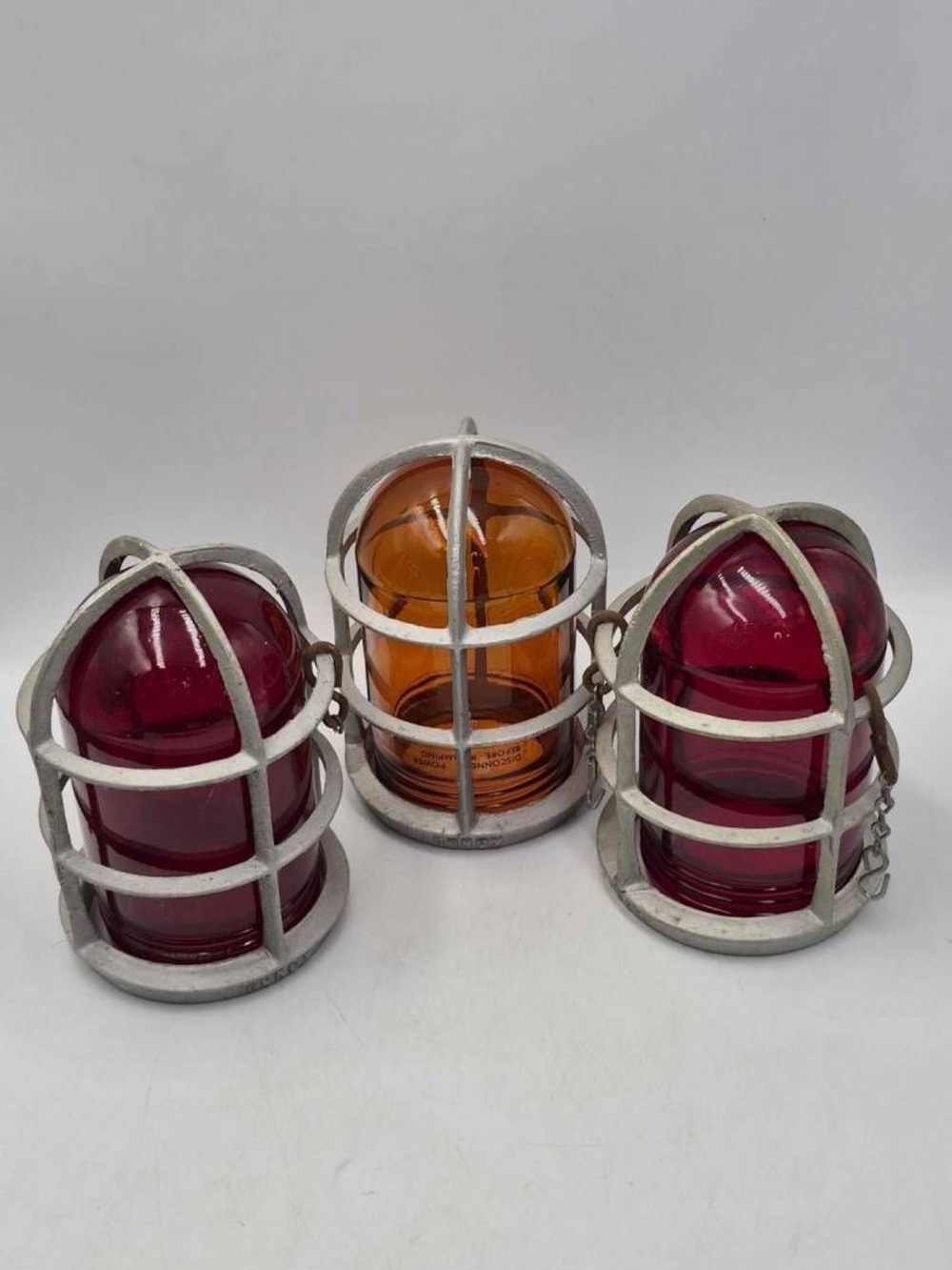 Industrial Style Amber and Ruby Glass Cage Lights - Unbranded